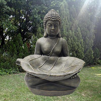 Customized religious figurines fiberglass sitting buddha holding leaf bird feeder statue ornament