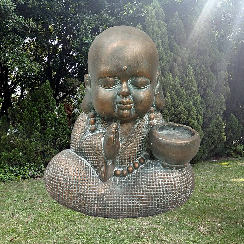 Lovely praying baby buddha monk statue with tealight candle holder for sale